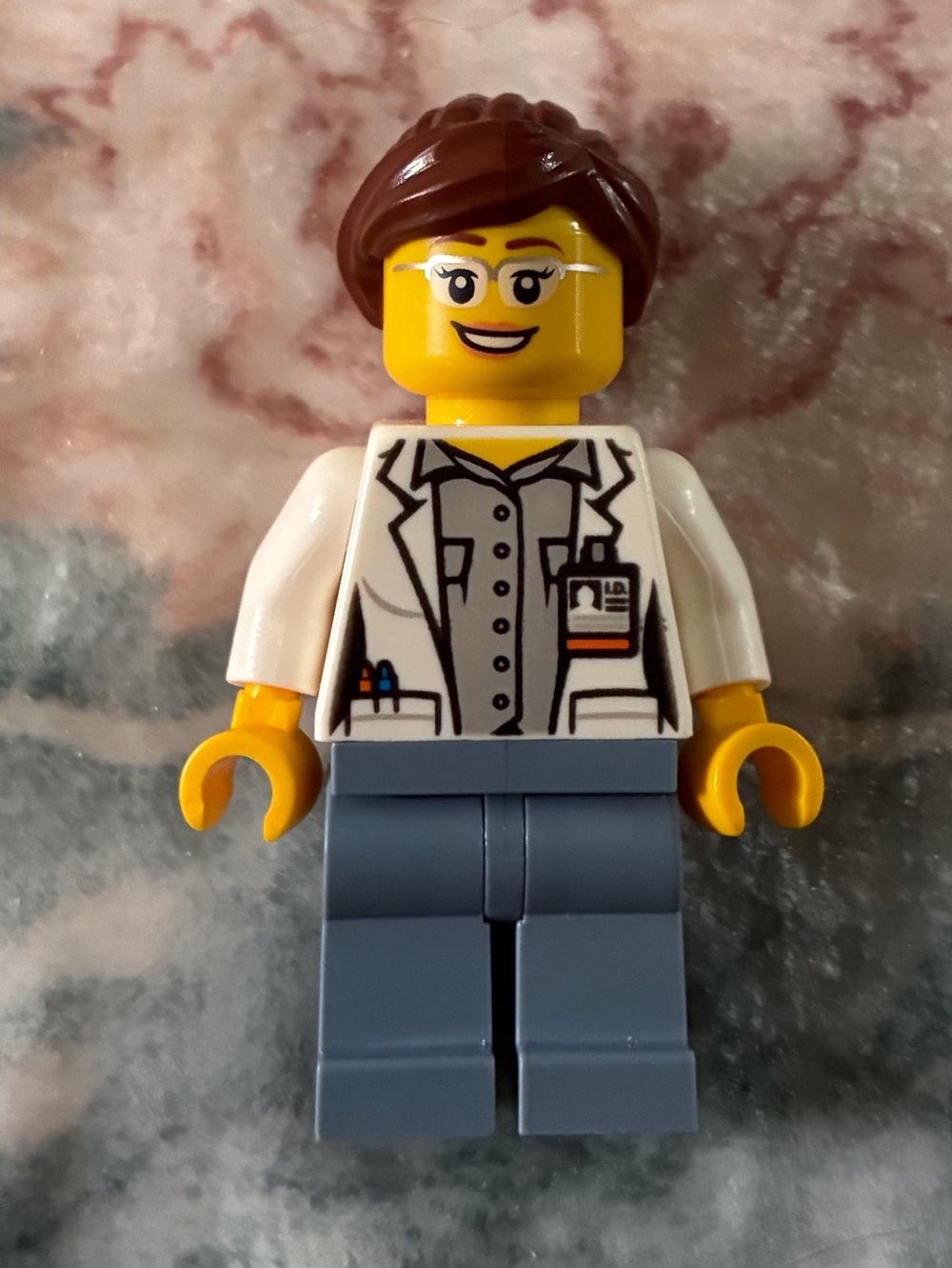 LEGO Minifigure Female Scientist with Brown Hair and Light Blue Legs